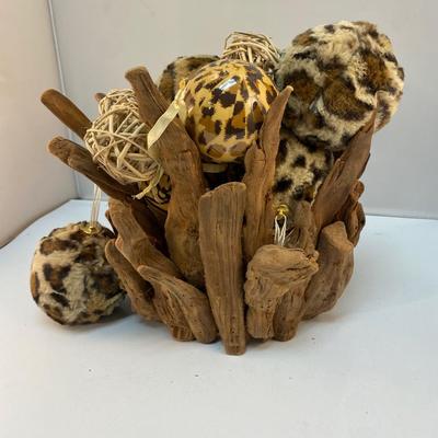 Driftwood Display Basket Filled with Natural Reed and Leopard Print Ball Ornaments