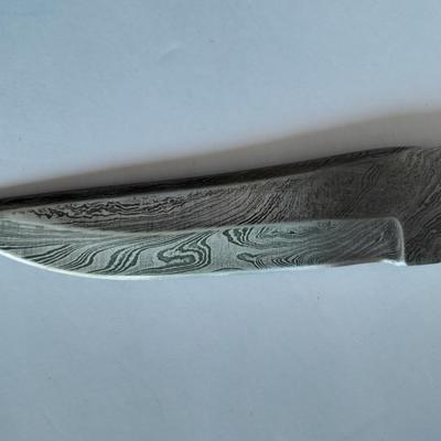 Custom Made Damascus Steel Knife with multi-colored inlayed wooden handle. Beautiful Knife!