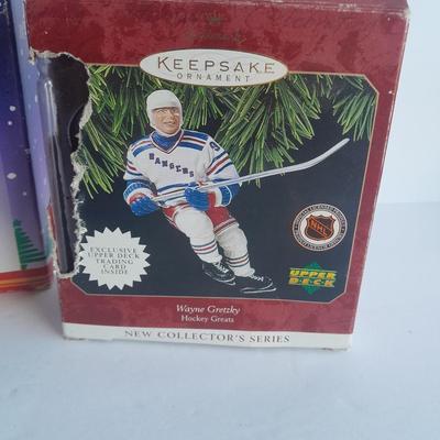 Hallmark Majic Johnson and Wayne Gretzky Ornaments with a Football Santa
