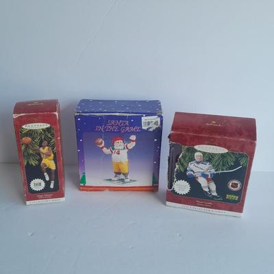 Hallmark Majic Johnson and Wayne Gretzky Ornaments with a Football Santa