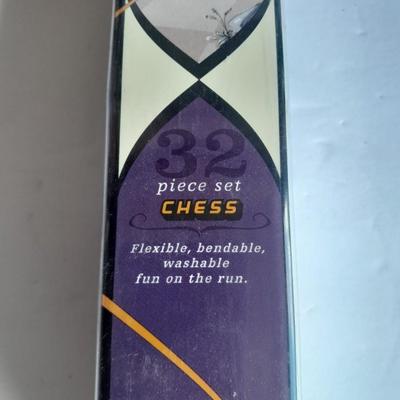 Tabletop Foosball game in the box and a Play anywhere Chess game, also new in the box