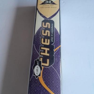 Tabletop Foosball game in the box and a Play anywhere Chess game, also new in the box