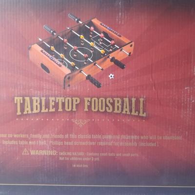 Tabletop Foosball game in the box and a Play anywhere Chess game, also new in the box