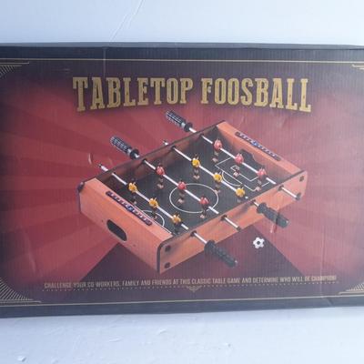 Tabletop Foosball game in the box and a Play anywhere Chess game, also new in the box