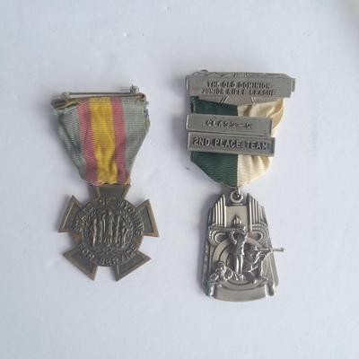 Two military badges and US hat pin