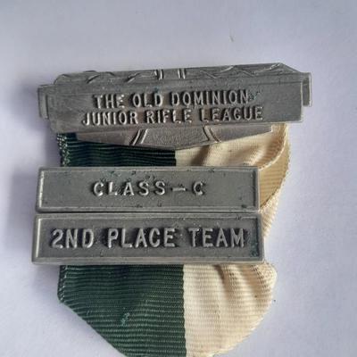 Two military badges and US hat pin