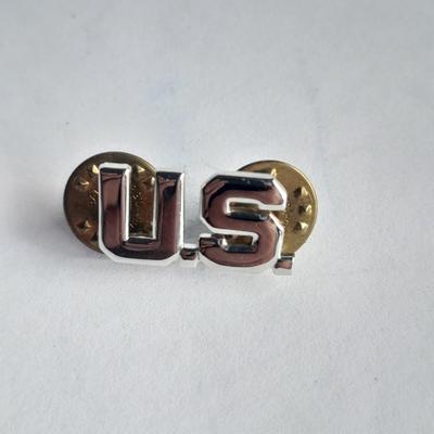 Two military badges and US hat pin