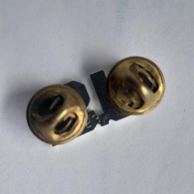 Two military badges and US hat pin