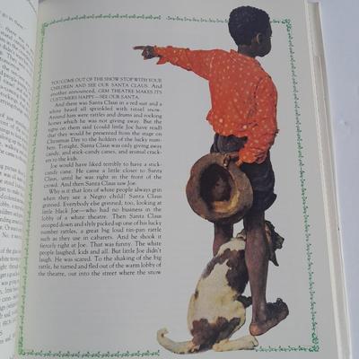 Christmas Norman Rockwell books with a Norman Rockwell Christmas ornament