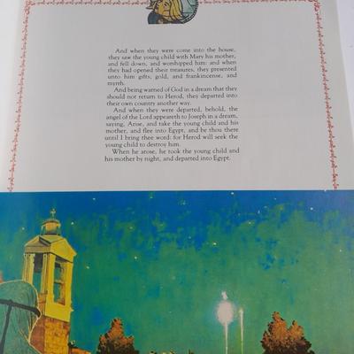 Christmas Norman Rockwell books with a Norman Rockwell Christmas ornament
