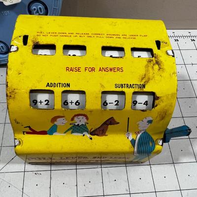 (2) Marx Tin Litho Arithmetic Learning Machine, plus Teach Time Clock
