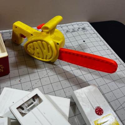 Mixed Lot Fisher Price Action Films and Record Player,  Chain Saw and a shape Ball  