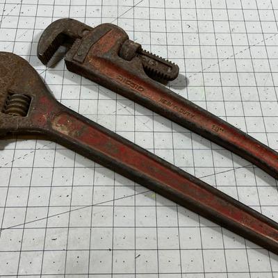 (2)  18" Pipe Wrench and a 20" Crescent Wrench 