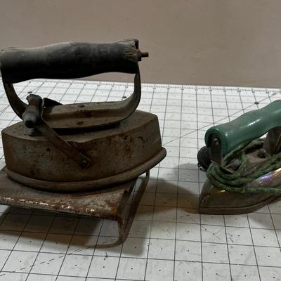 2 Antique Irons; 1 electric and 1 heat up on the Stove