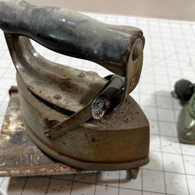 2 Antique Irons; 1 electric and 1 heat up on the Stove