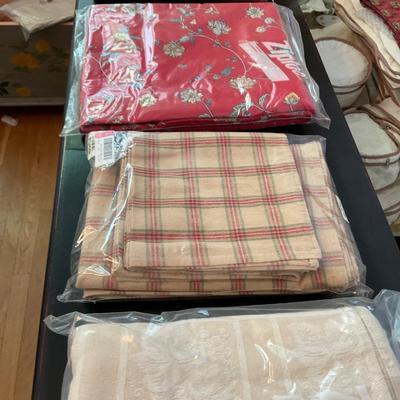 Four Tablecloths.