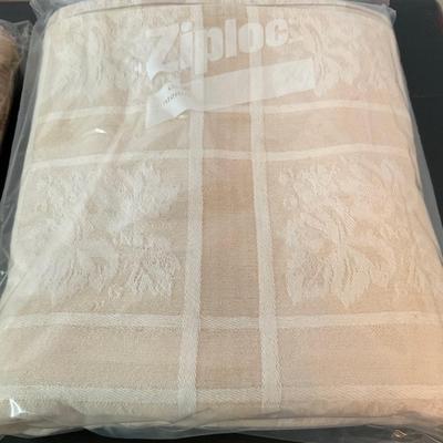 Four Tablecloths.
