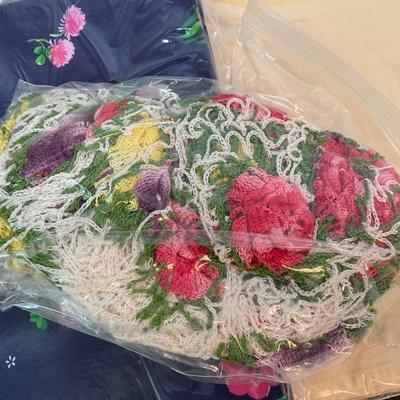 Tablecloths and bag of Doilies.