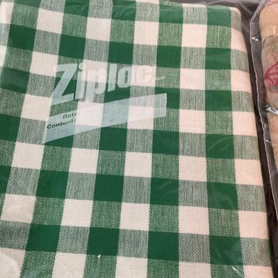 Tablecloths and bag of Doilies.