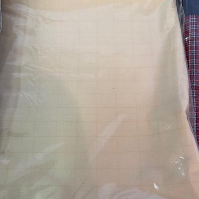 Tablecloths and bag of Doilies.