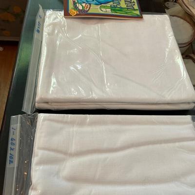2- 52x70 and 1- 60x102 Tablecloths and Napkins.
