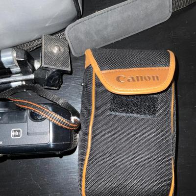 Canon Sure shot 38 mm lens with tripod.
