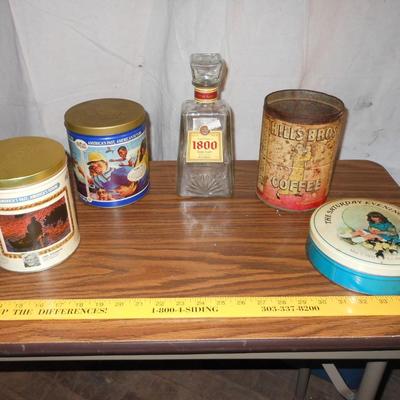 A COLLECTION OF TINS AND OLD BOTTLES