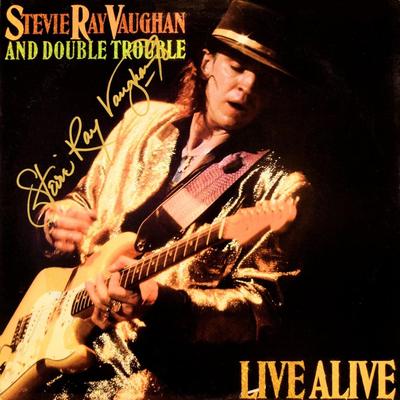Stevie Ray Vaughan and Double Trouble signed Live Alive album