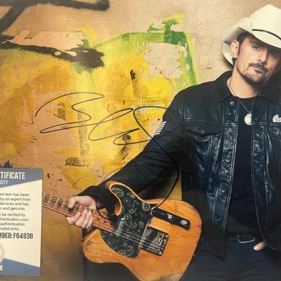 Brad Paisley signed photo.  Beckett authenticated
