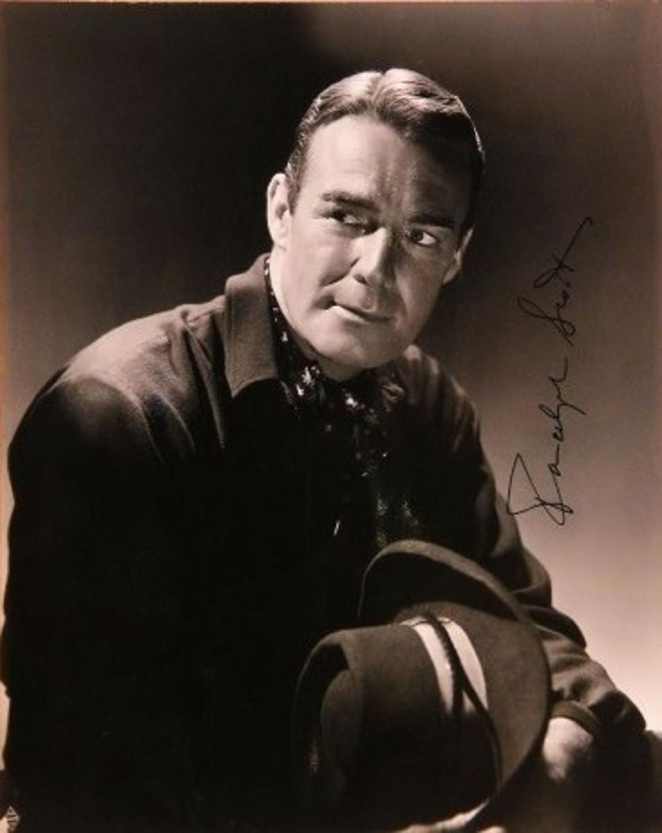 Randolph Scott signed portrait photo | EstateSales.org