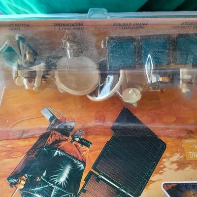 JPL Return to Mar's Hot Wheels Action pack, Books on Space, Trading cards, and Geological maps of the Descartes Region of the moon