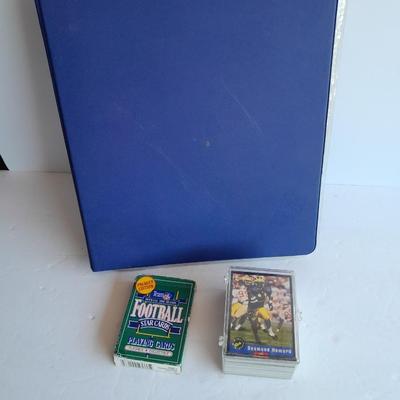 Football Trading cards, 3 ring binder with over 20 pages and Premier edition star cards Playing cards