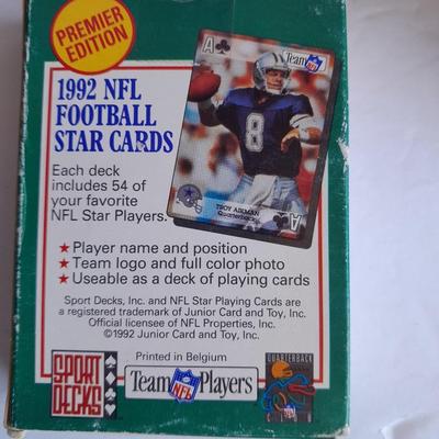 Football Trading cards, 3 ring binder with over 20 pages and Premier edition star cards Playing cards
