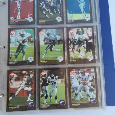 Football Trading cards, 3 ring binder with over 20 pages and Premier edition star cards Playing cards