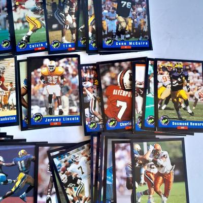 Football Trading cards, 3 ring binder with over 20 pages and Premier edition star cards Playing cards