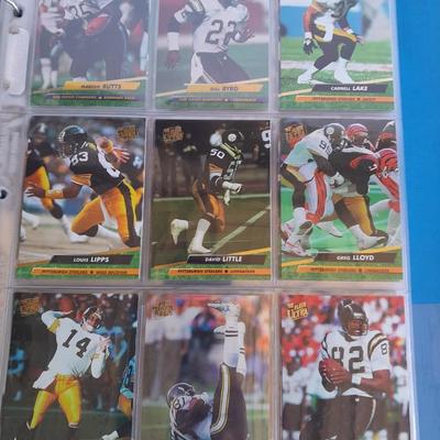 3 ring binder of Football cards, over 20 pages Rules of the game book, and 1970's Football stars book