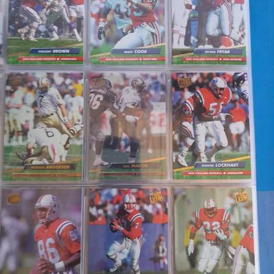 3 ring binder of Football cards, over 20 pages Rules of the game book, and 1970's Football stars book