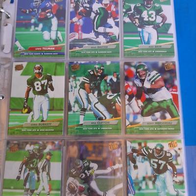 3 ring binder of Football cards, over 20 pages Rules of the game book, and 1970's Football stars book