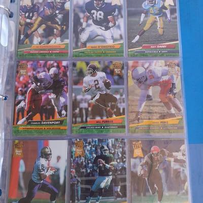3 ring binder of Football cards, over 20 pages Rules of the game book, and 1970's Football stars book
