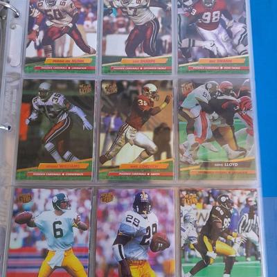 3 ring binder of Football cards, over 20 pages Rules of the game book, and 1970's Football stars book
