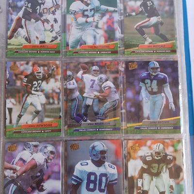 3 ring binder of Football cards, over 20 pages Rules of the game book, and 1970's Football stars book