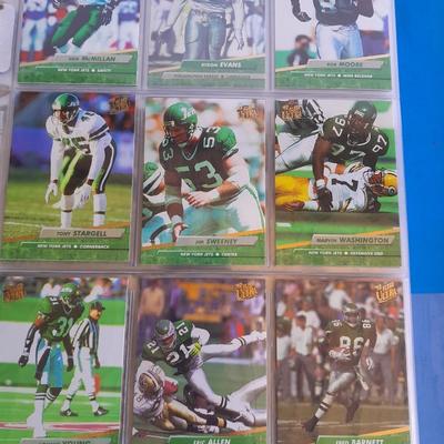 3 ring binder of Football cards, over 20 pages Rules of the game book, and 1970's Football stars book