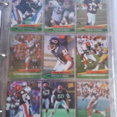 3 ring binder of Football cards, over 20 pages Rules of the game book, and 1970's Football stars book