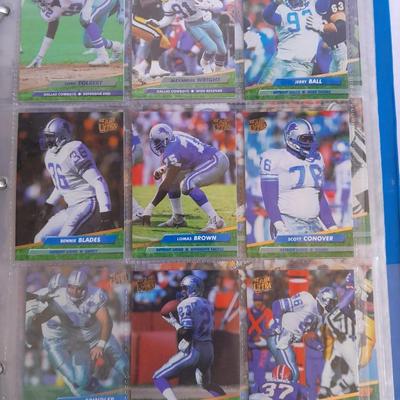 3 ring binder of Football cards, over 20 pages Rules of the game book, and 1970's Football stars book