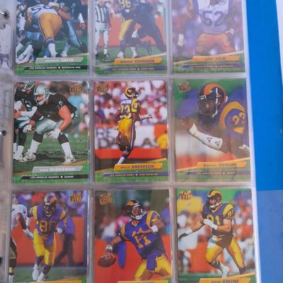 3 ring binder of Football cards, over 20 pages Rules of the game book, and 1970's Football stars book