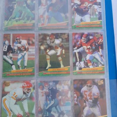 3 ring binder of Football cards, over 20 pages Rules of the game book, and 1970's Football stars book