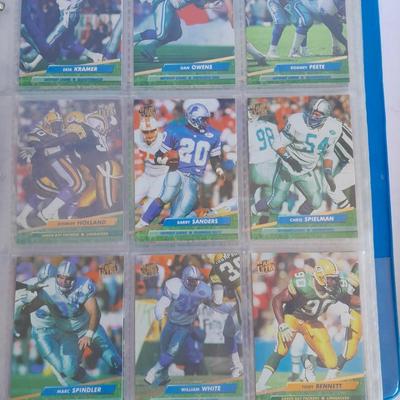 3 ring binder of Football cards, over 20 pages Rules of the game book, and 1970's Football stars book
