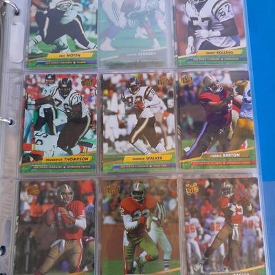 3 ring binder of Football cards, over 20 pages Rules of the game book, and 1970's Football stars book