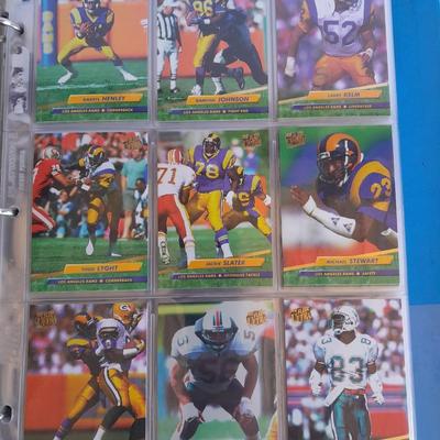 3 ring binder of Football cards, over 20 pages Rules of the game book, and 1970's Football stars book