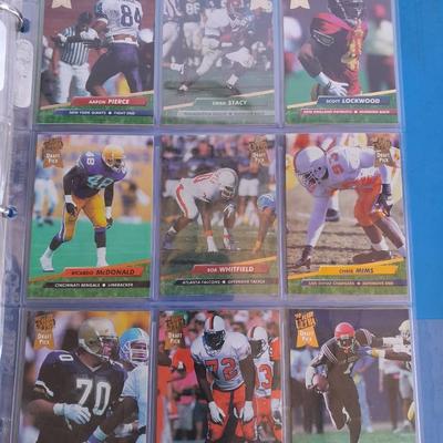 3 ring binder of Football cards, over 20 pages Rules of the game book, and 1970's Football stars book